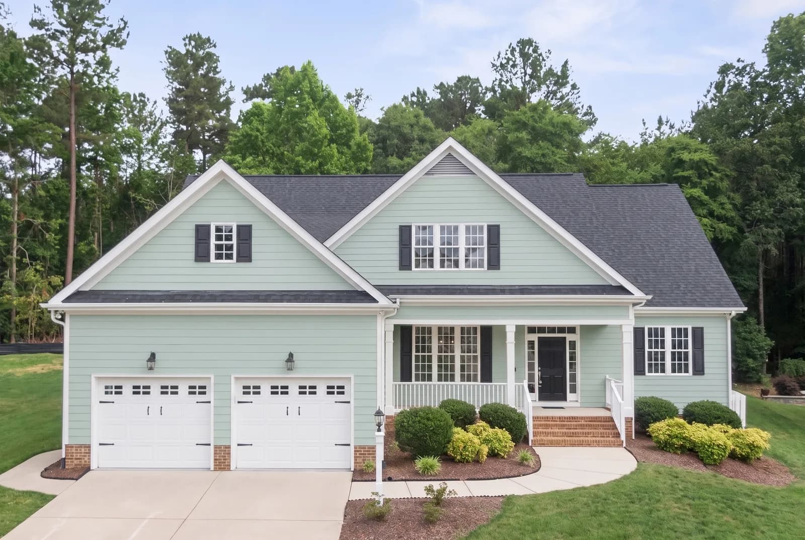 House siding rendered in Sherwin-Williams Sea Salt SW 6204, roof, shutters and white trim unchanged