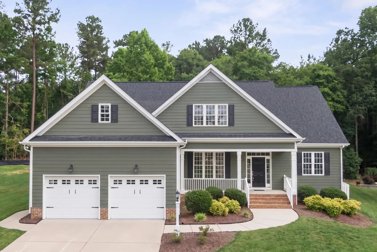 House siding rendered in Sherwin-Williams Pewter Green SW 6208, roof, shutters and white trim unchanged